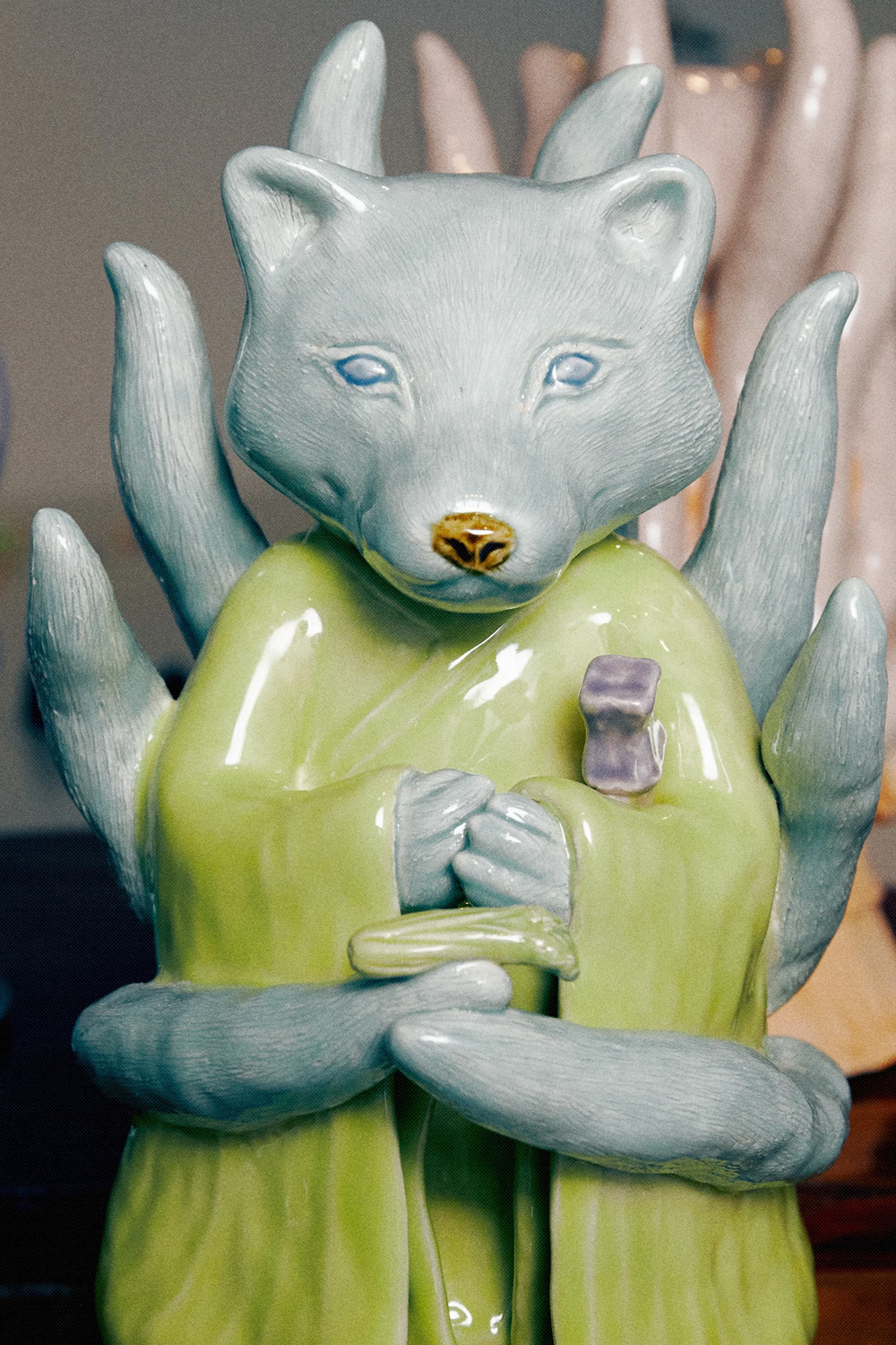 Glazed ceramic sculpture of a fox figure