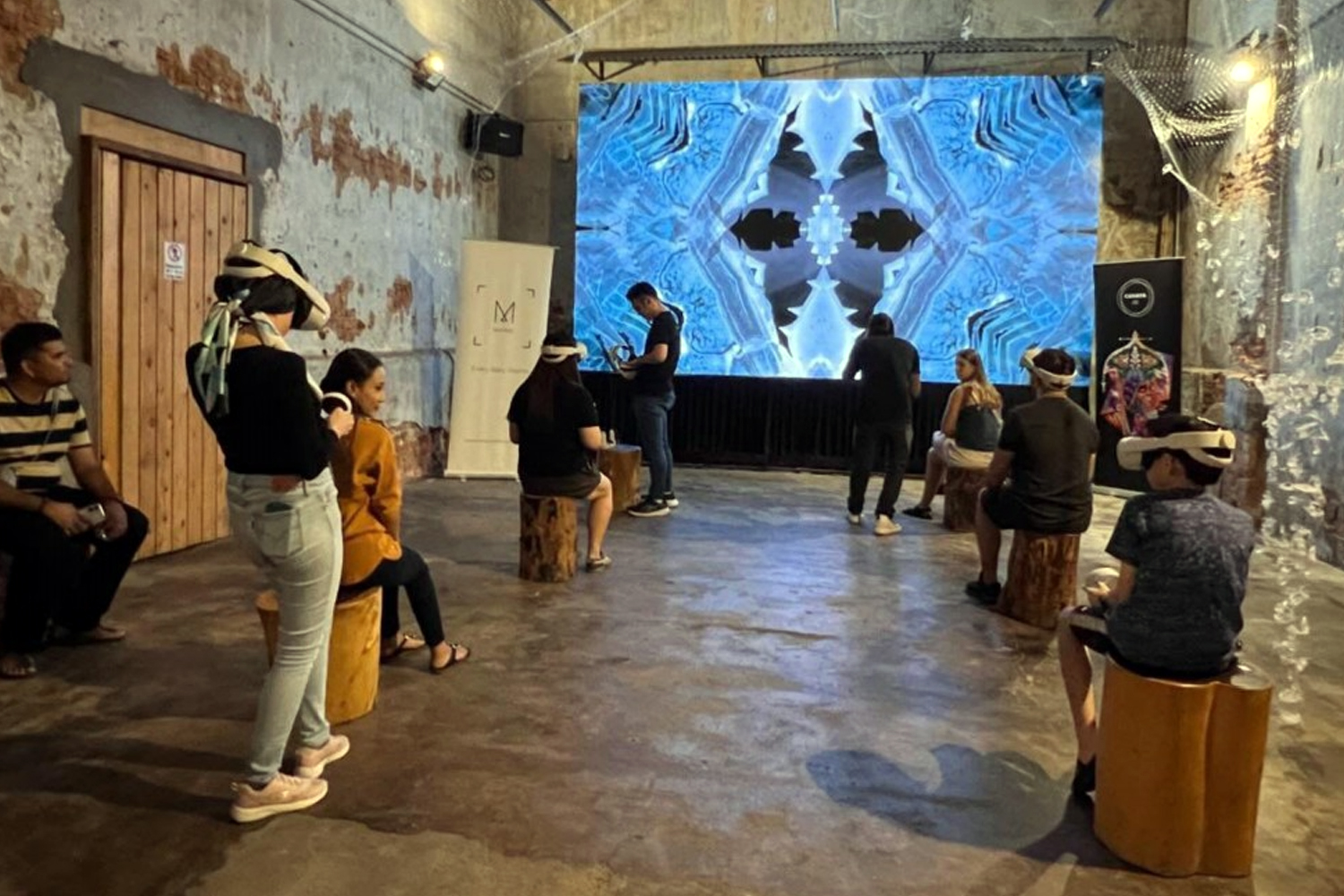 Visitors experiencing an immersive art projection